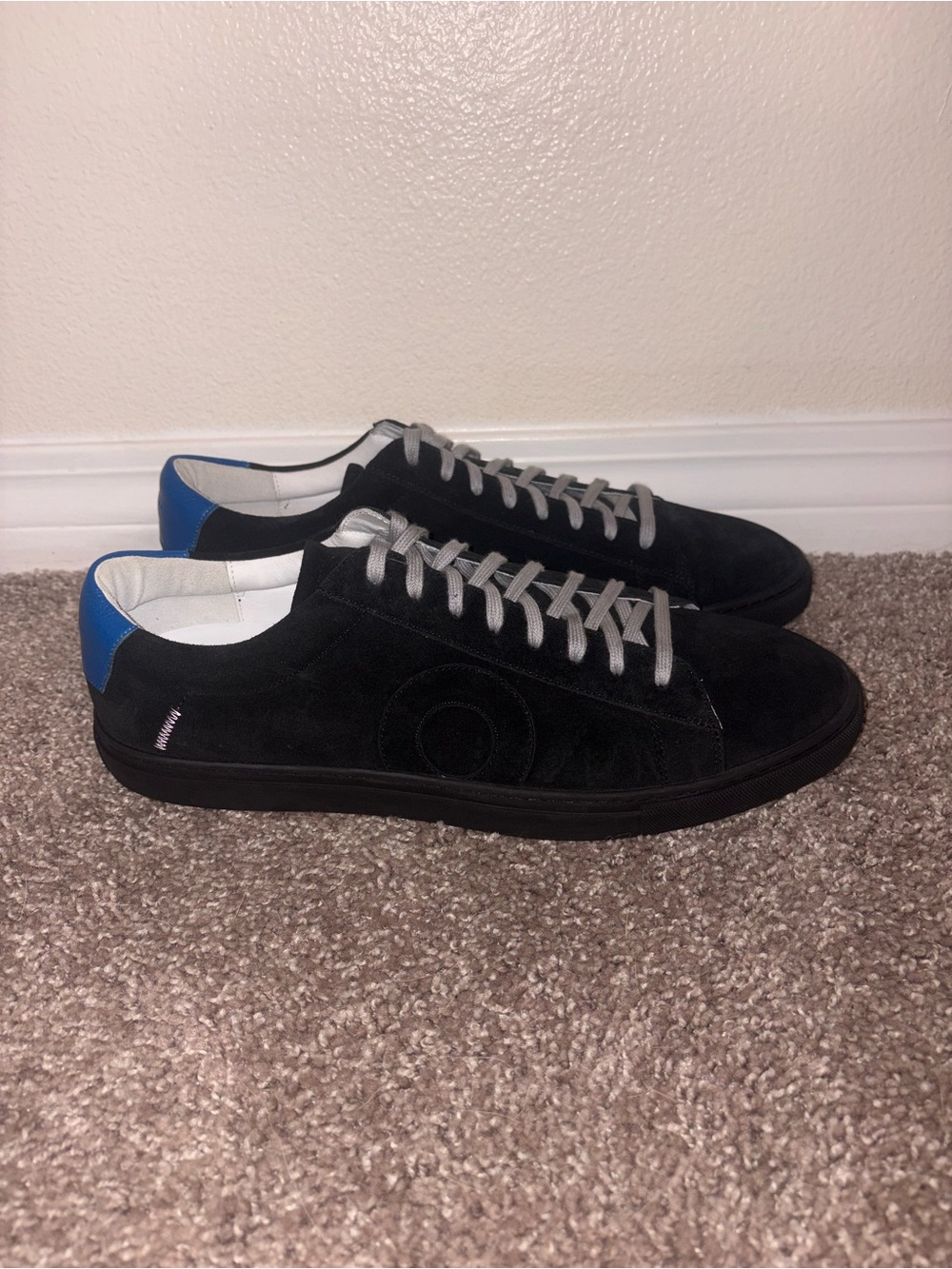 Oliver Cabell Low 1 black suede sneakers with blue heel accents and grey laces